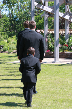 I like the height difference between the last groomsman and the ringbearer, who is really concentrating on walking in step!