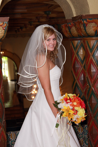 What a cute bride - we did this shot in front of the columns on the second floor, the ballroom is in the background.